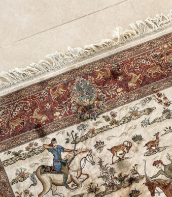 Handwoven Iranian Carpet with intricate patterns and vibrant colors, ideal for luxury home decor and international trade.