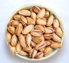 Premium Iran Akbari Pistachio, high-quality, elongated, and flavorful nuts ideal for gourmet snacking and culinary use, sourced from top-quality harvests for superior taste and texture.
