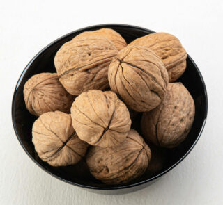 Premium Iranian Tuyserkan Walnut in natural shells, ideal for export markets seeking high-quality, flavorful walnuts.